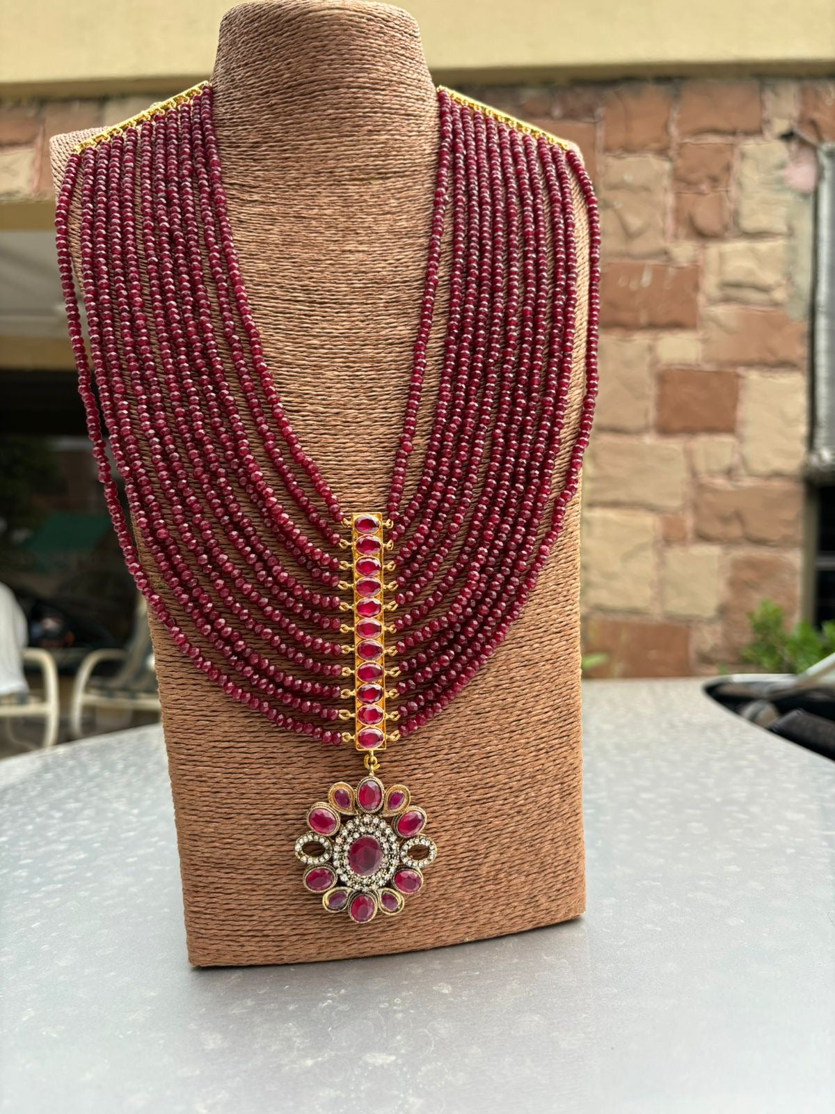 Red jade mala set with silver sterling motive and gold plated motives