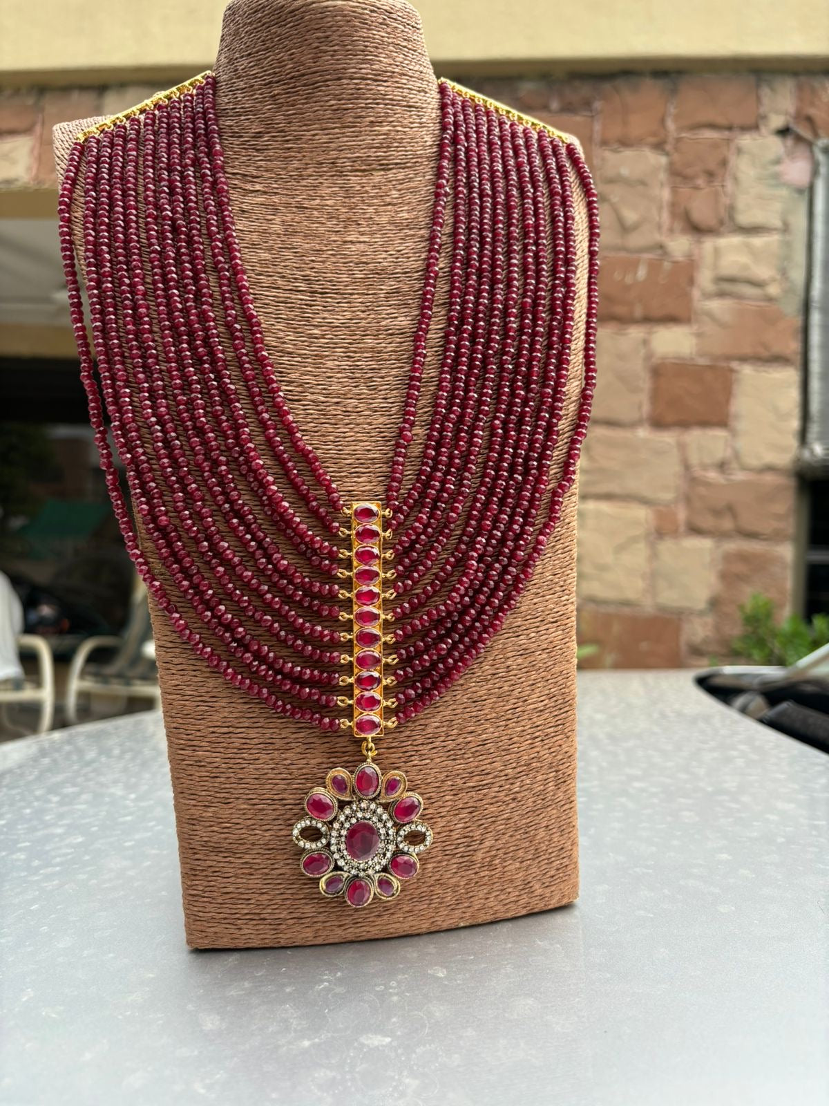 Red jade mala set with silver sterling motive and gold plated motives