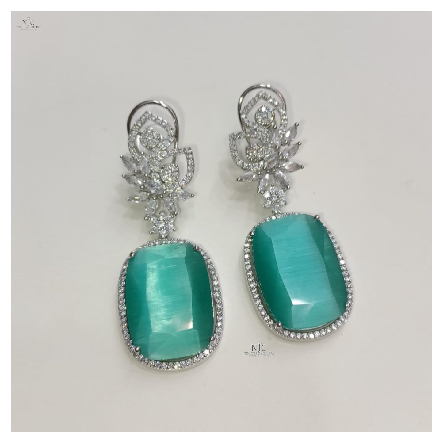 Double stone fancy earrings