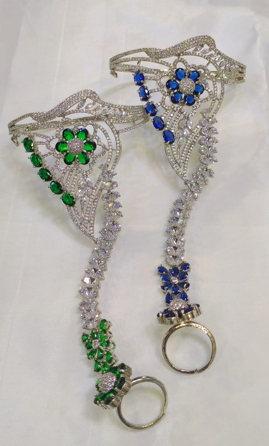 Karas with attached finger ring