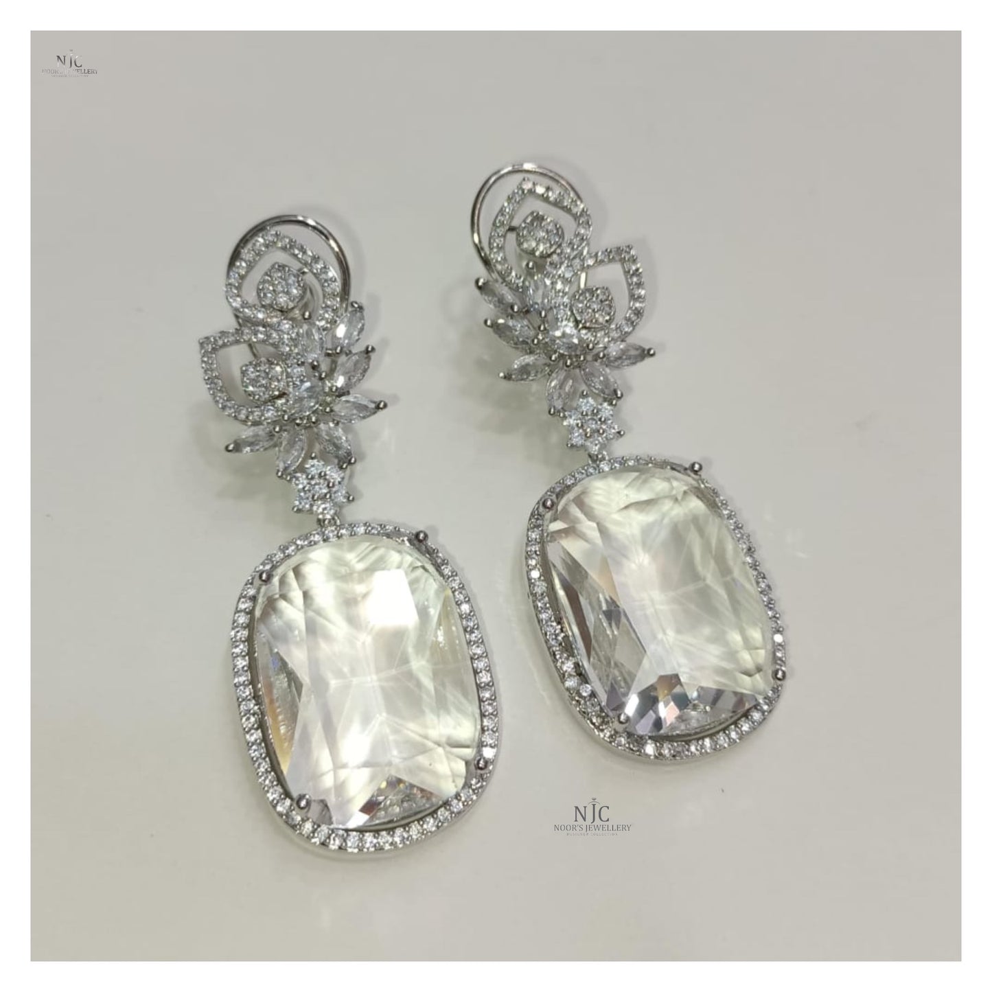 Double stone fancy earrings