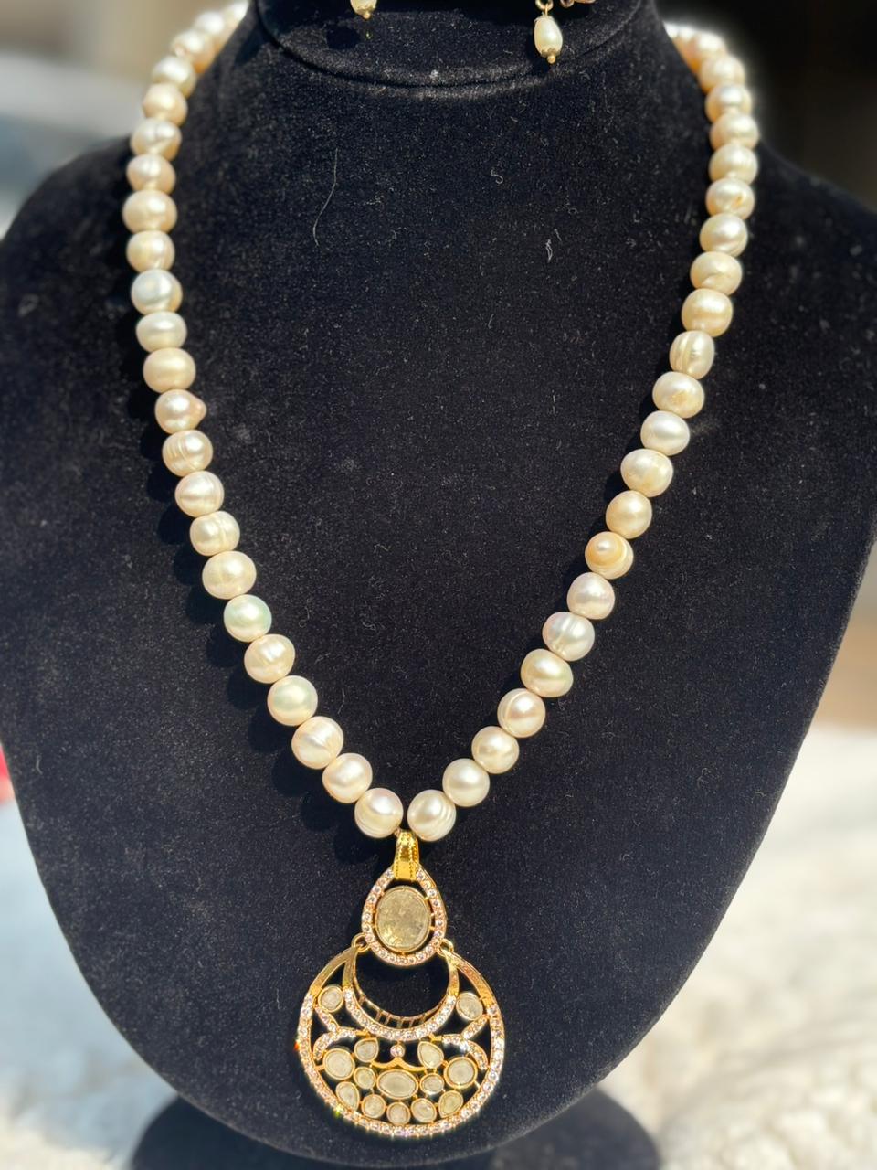 Silver sterling gold plated with original diamond polki and real pearl