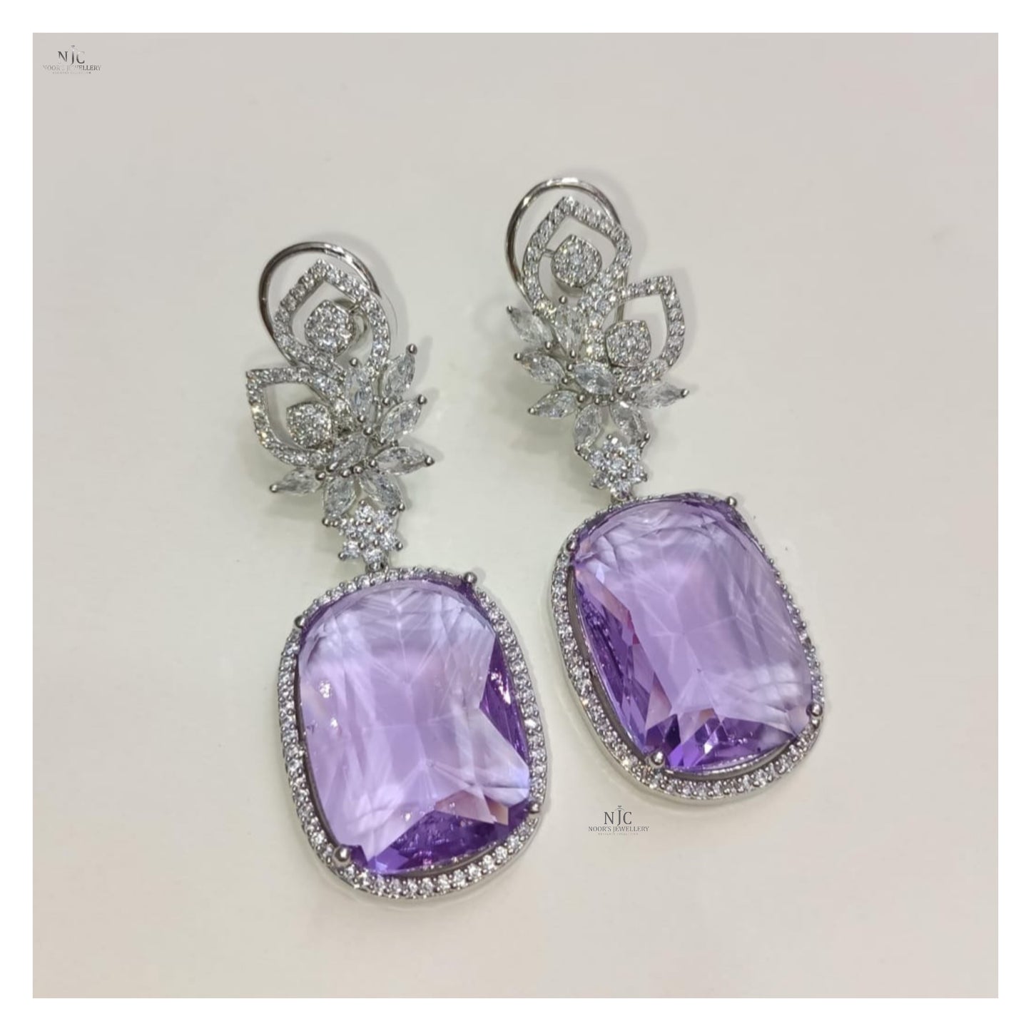 Double stone fancy earrings