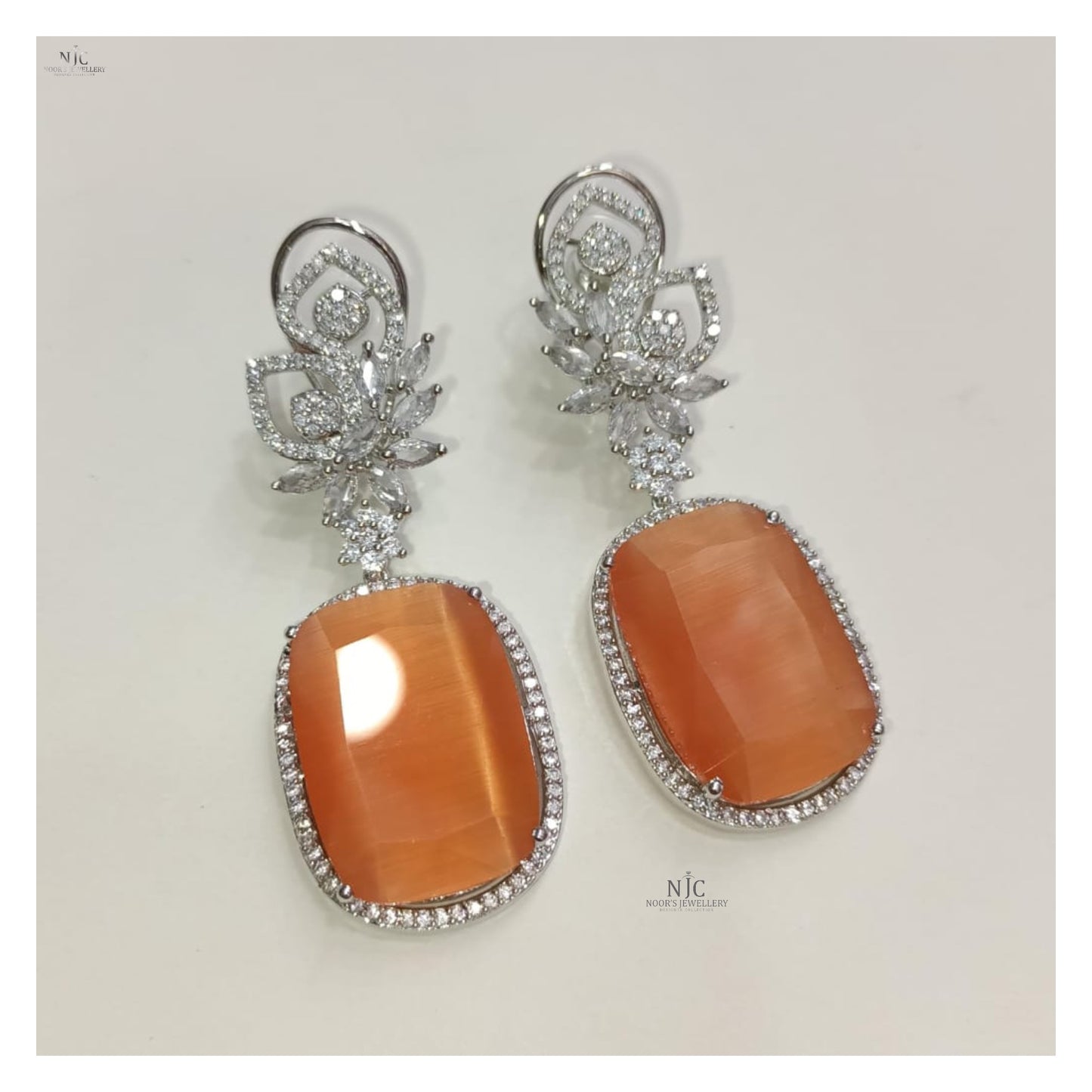 Double stone fancy earrings