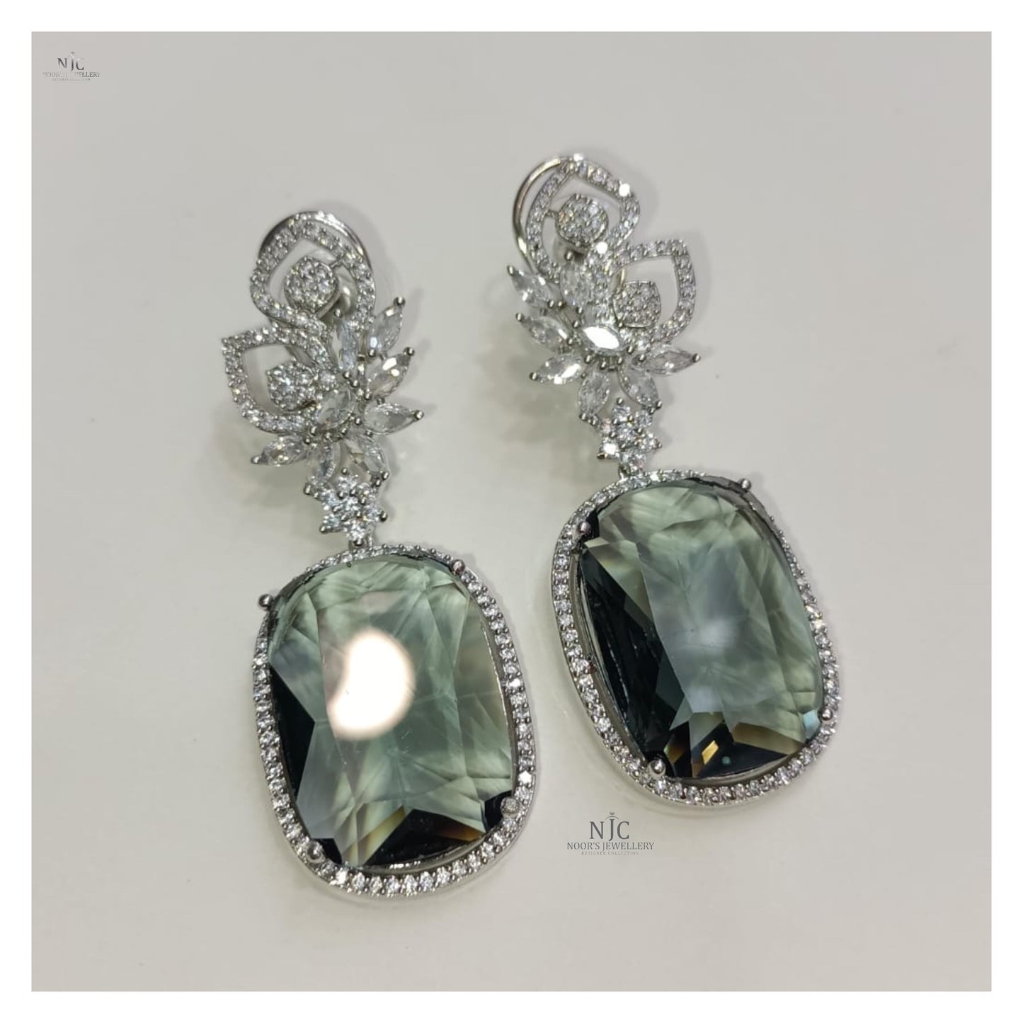 Double stone fancy earrings