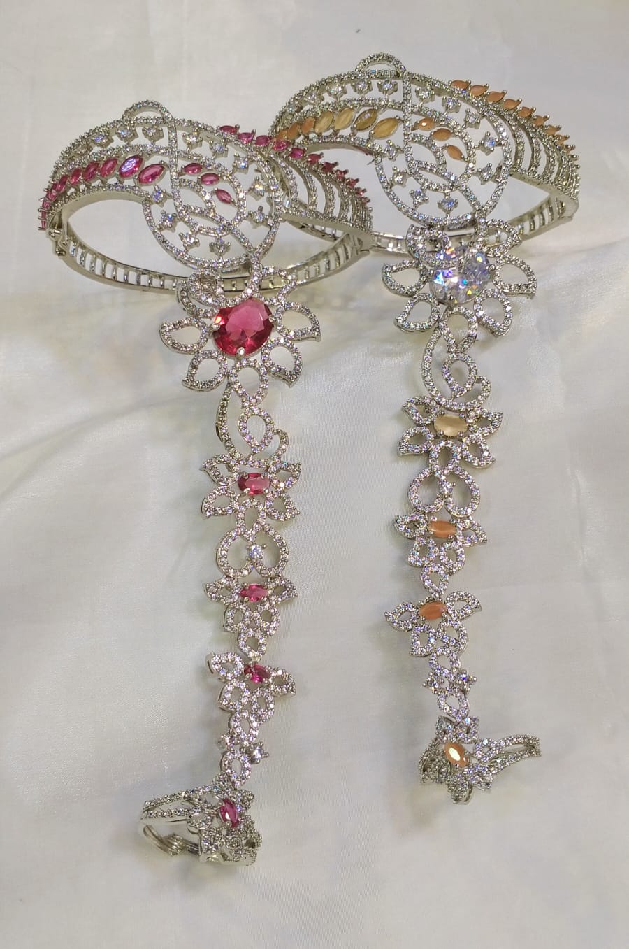 Karas with attached finger ring