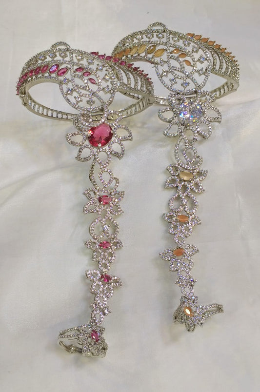 Karas with attached finger ring