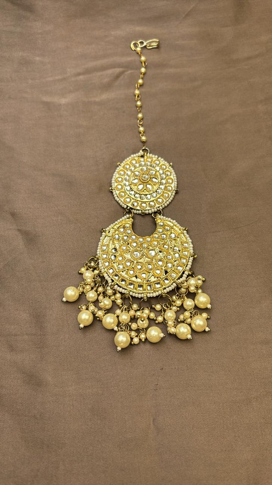 Golden kundan tikka