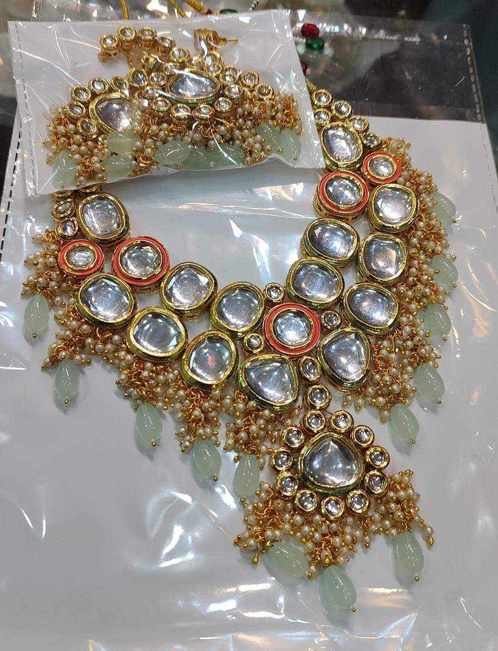 Kundan mint green double sided necklace sets